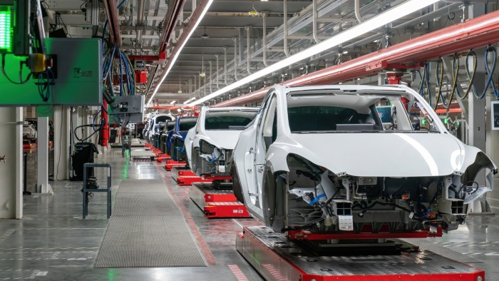 Tesla results disappoint but Musk touts coming robots and ‘cybercabs’